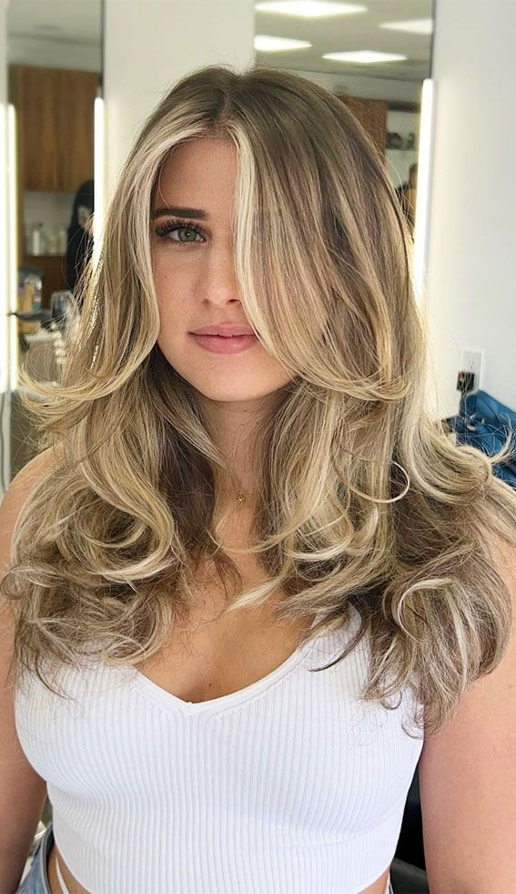 Butterfly Cut with Face-Framing Highlights