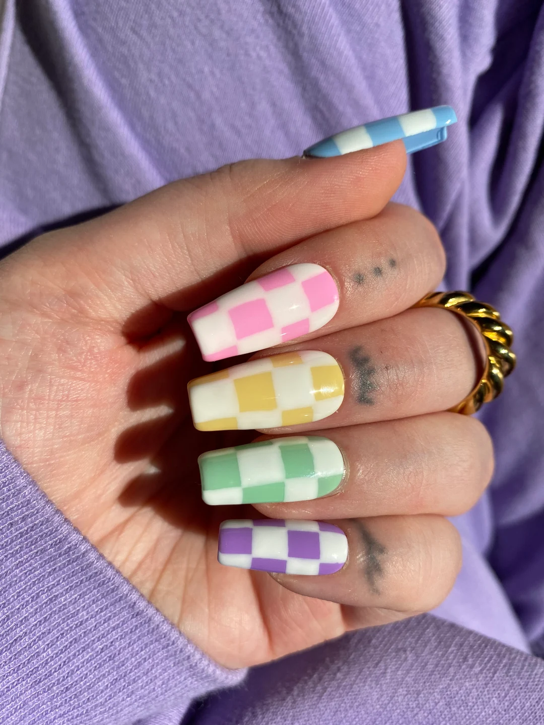 Checkerboard in pastel nails