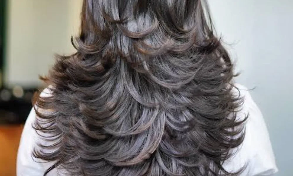 Layered Butterfly Cut with Middle Part