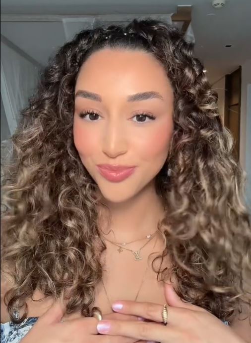 curly hairstyle with ponytail