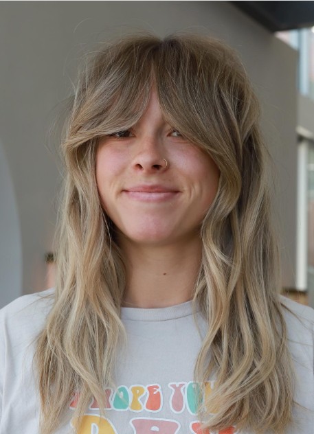 Choppy Curtain Bangs with Lived-In Texture