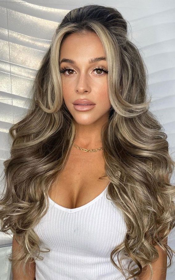 Curtain Bangs in a Half-Up, Half-Down Style