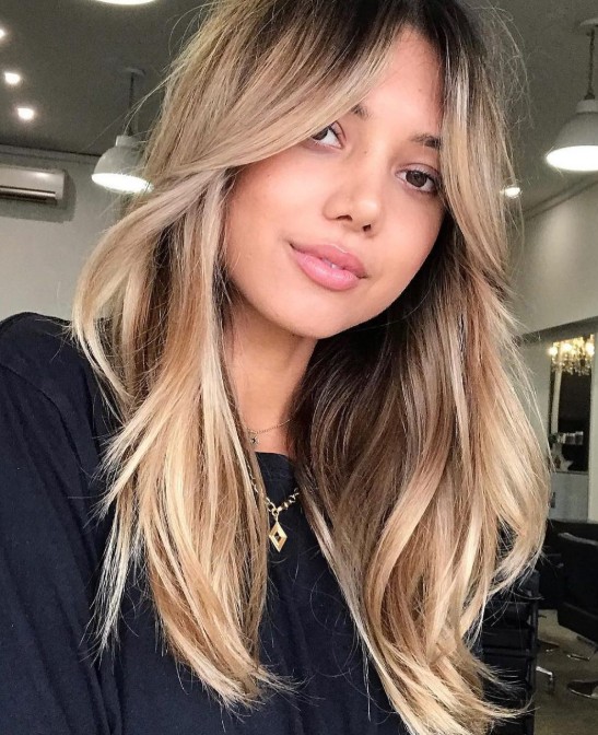 Curtain Bangs with Honey-Toned Highlights