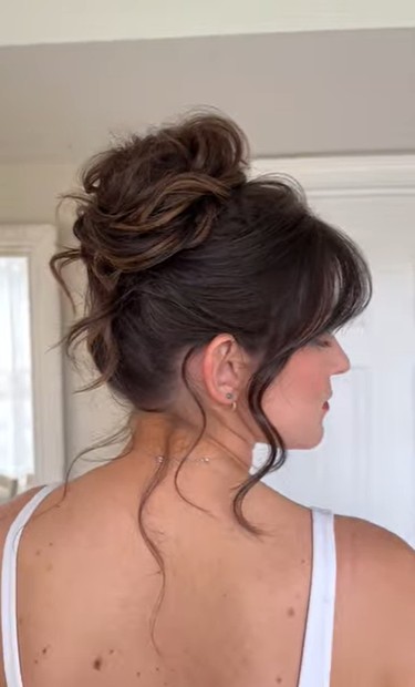Curtain Bangs with a Low Messy Bun